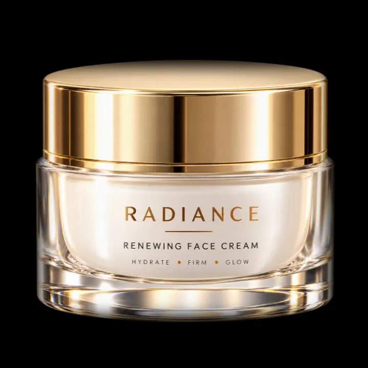 A face cream jar with a gold lid.